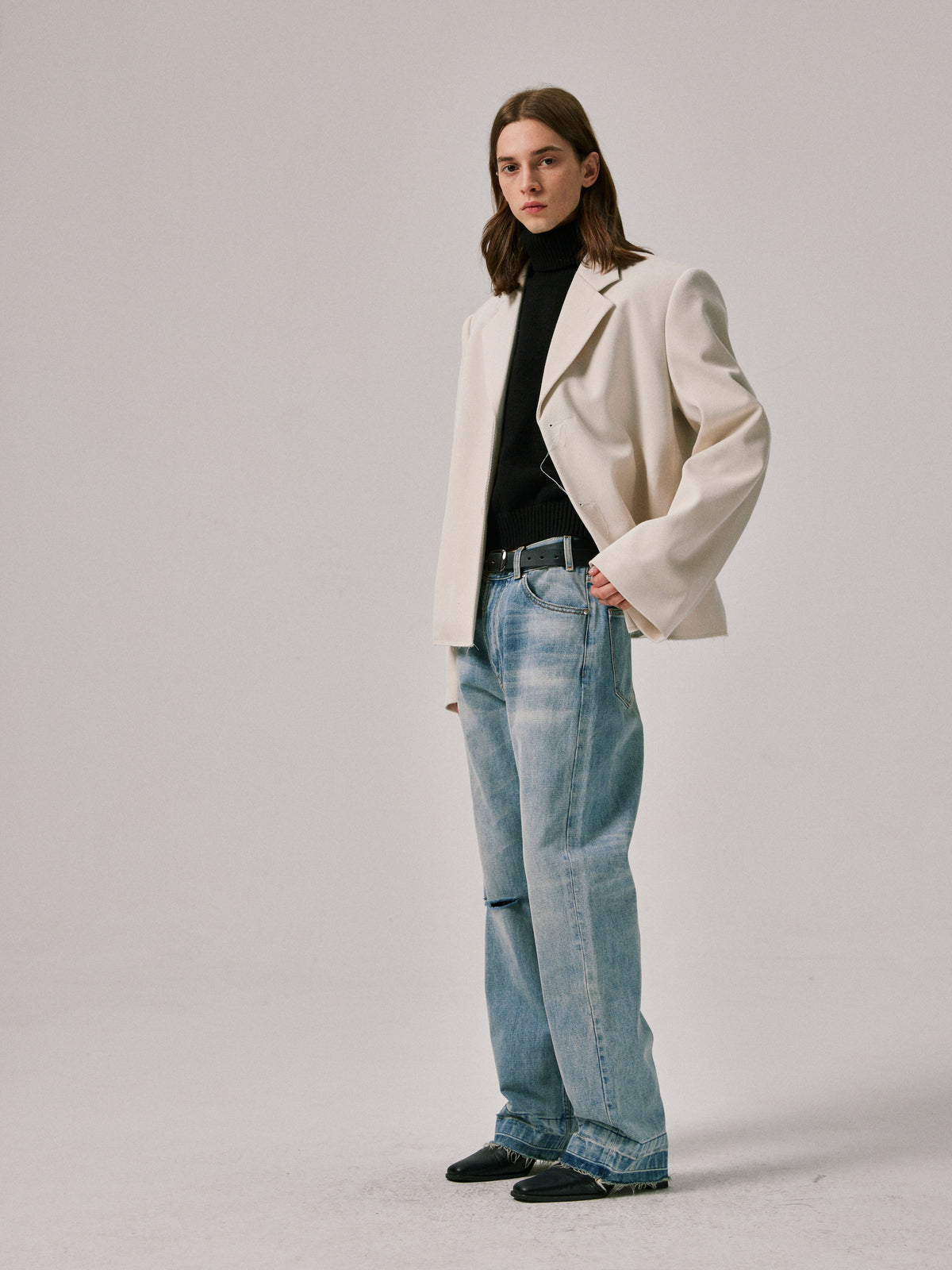 Bootcut Jeans in Slash-Cut Ripped Blue